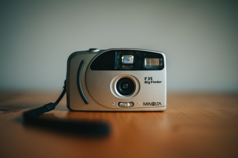 Close-up of a vintage camera, symbolizing the photographer’s early start in photography