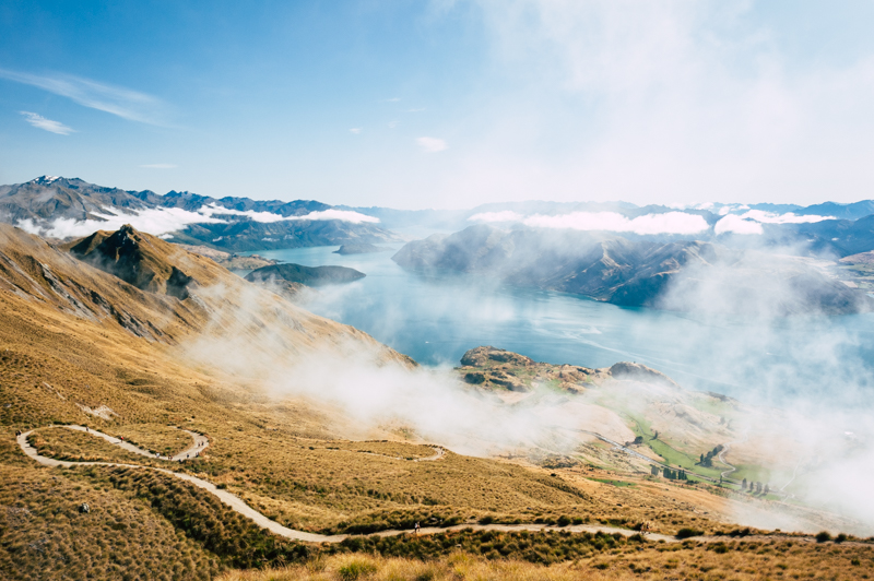 Panoramic view on the way to the top of Roy's Peak in New Zealand, showing surrounding lakes and mountains